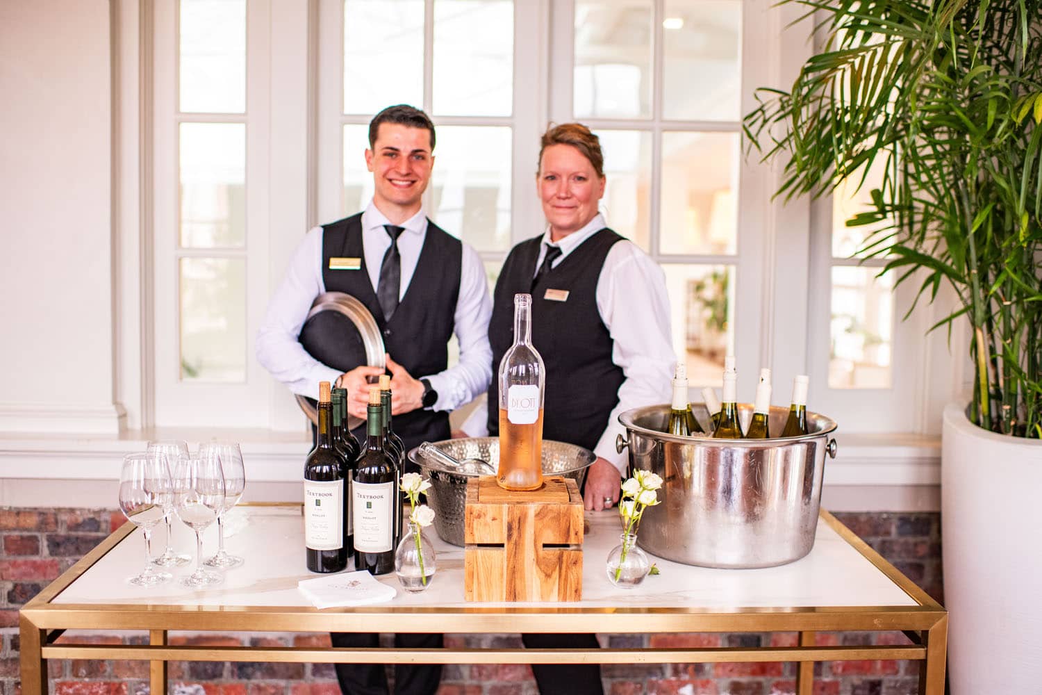 Bar tenders serving wine at an event at The Historic Cavalier Hotel