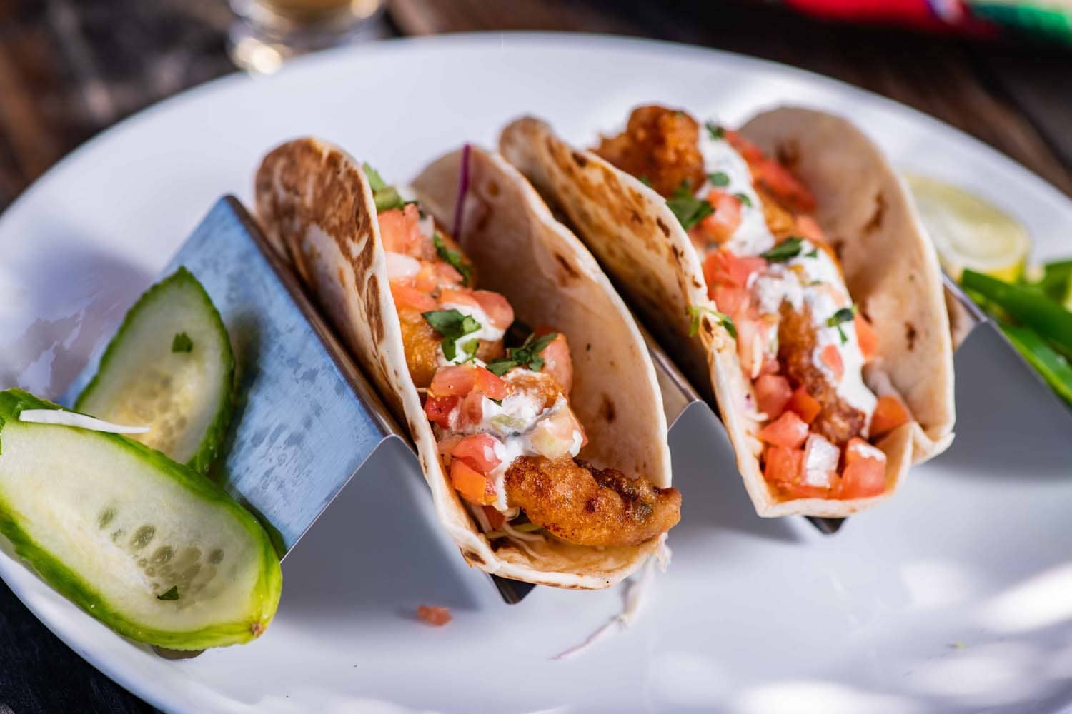 A close-up of plated tacos on a table at Tacos-N-Tequila restaurant
