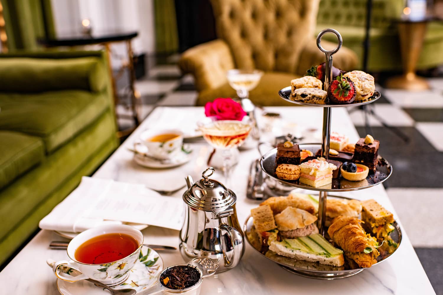 Sandwiches and tea displayed neatly on a table
