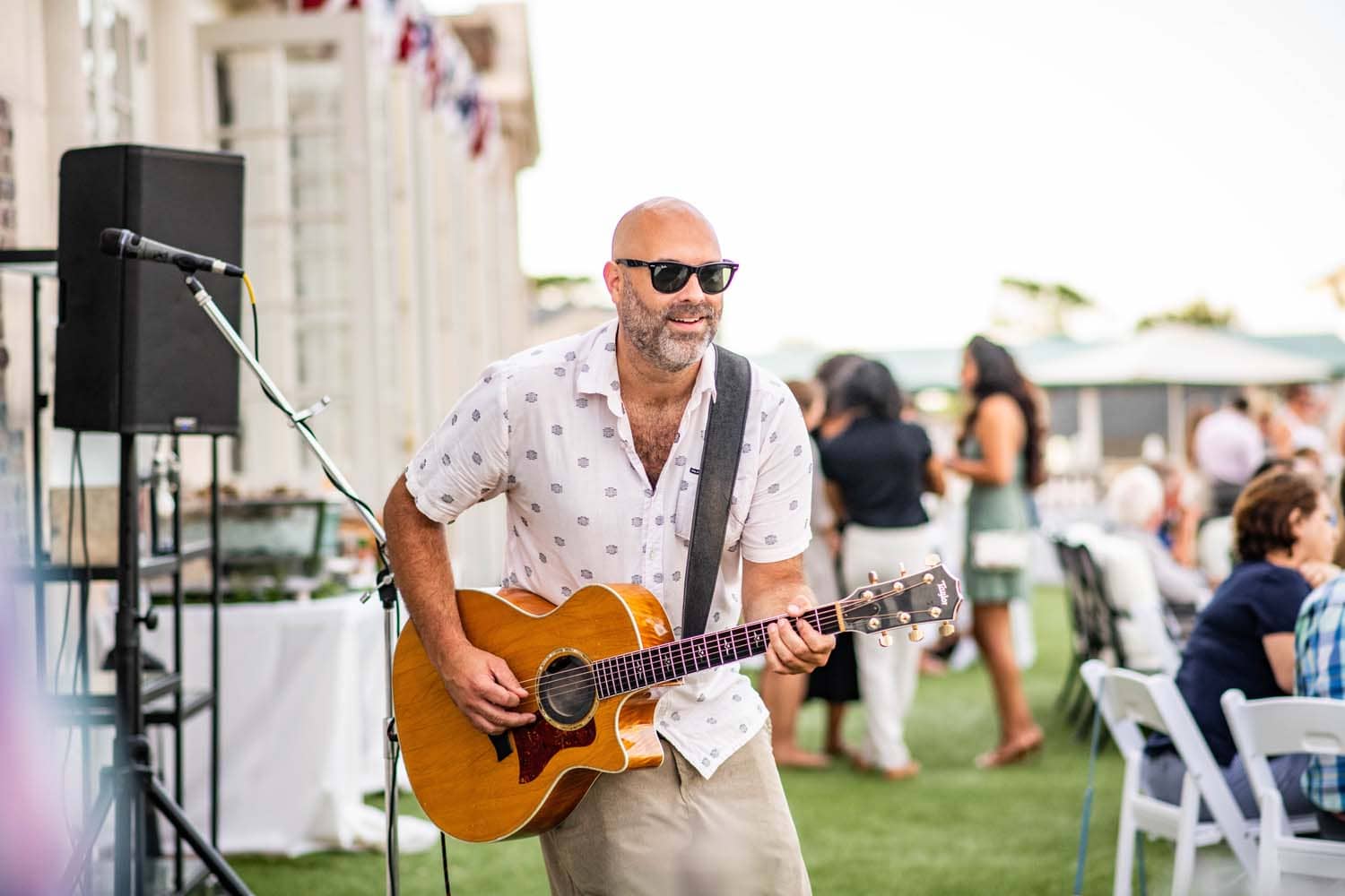 An artist performing live music at The Historic Cavalier Hotel