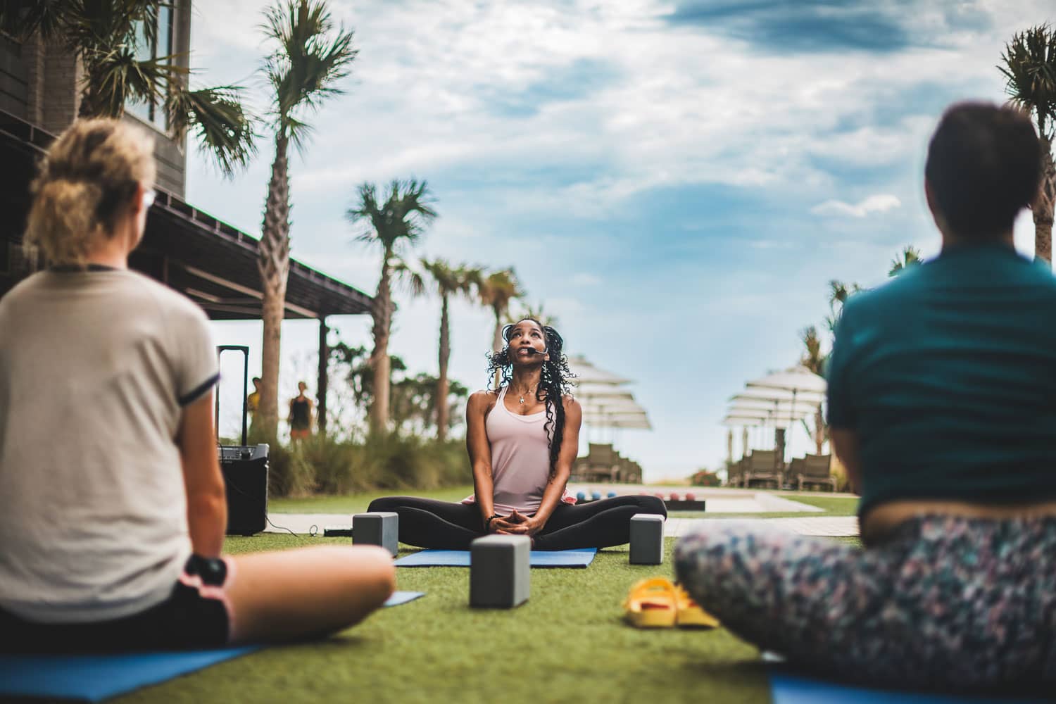 A yoga instructor teaching a class at the Marriott Virginia Beach Oceanfront Resort