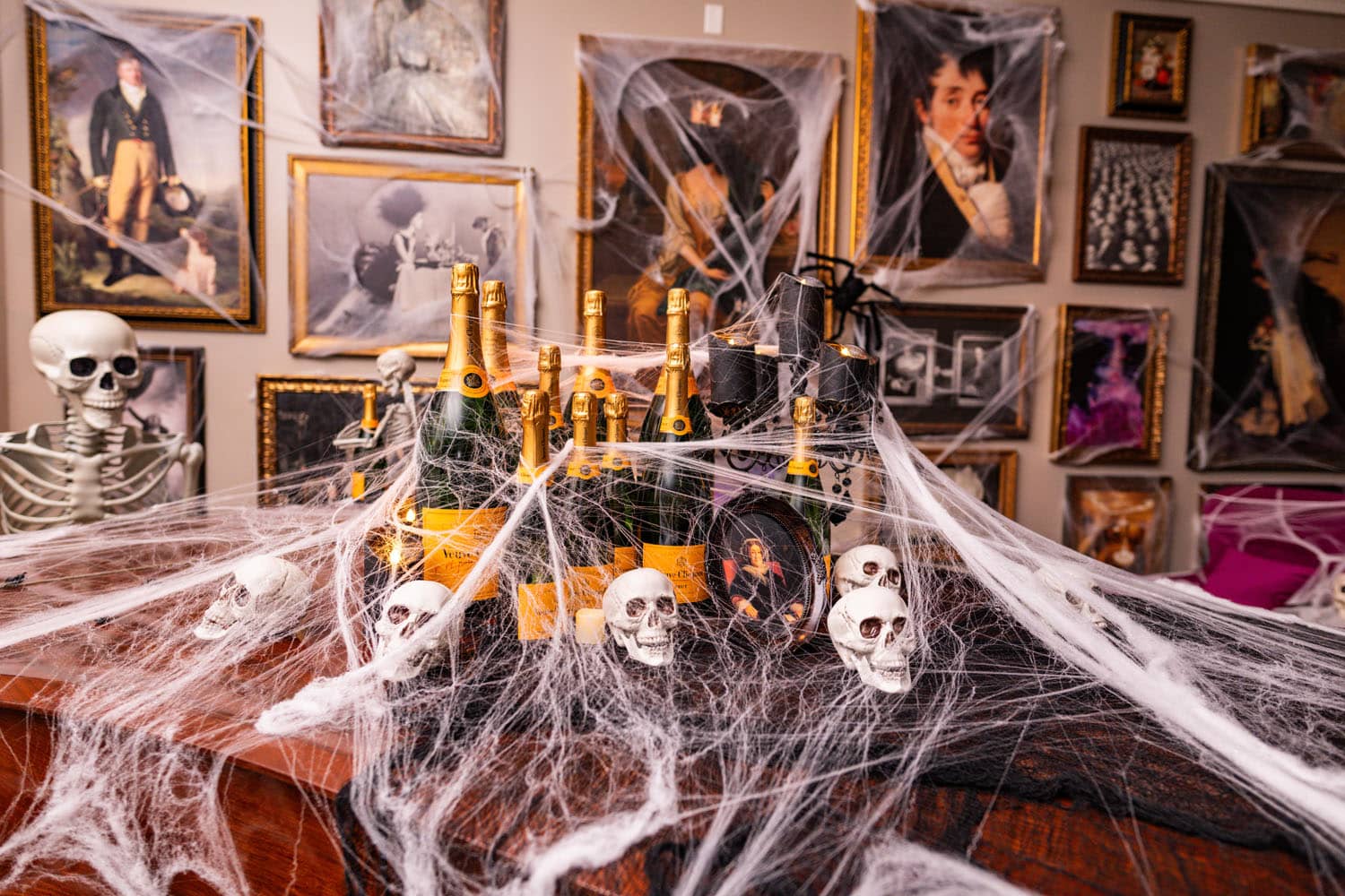 A spooky decorated table inside The Historic Cavalier Hotel for a Halloween party