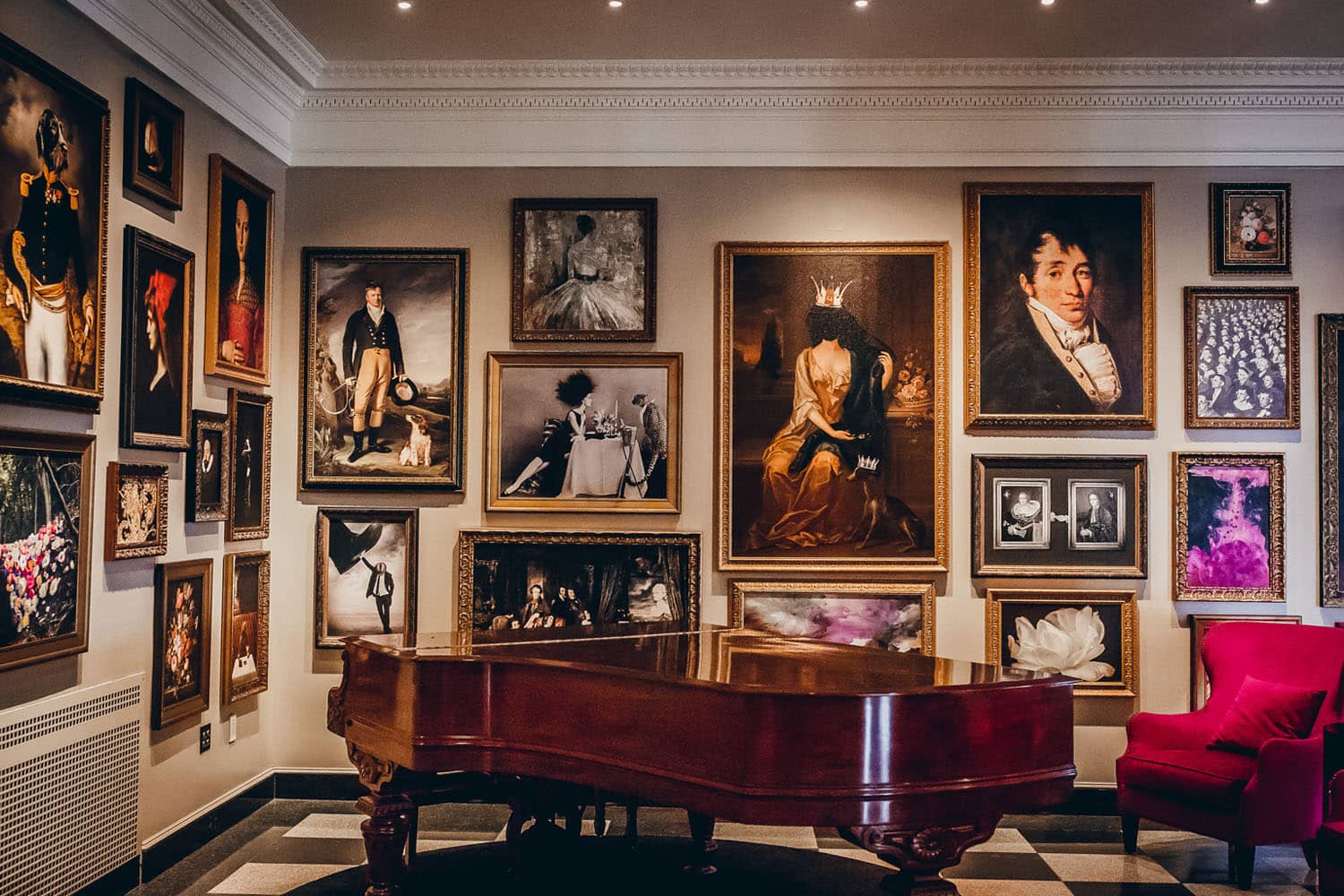 The interior artwork and piano inside The Raleigh Room