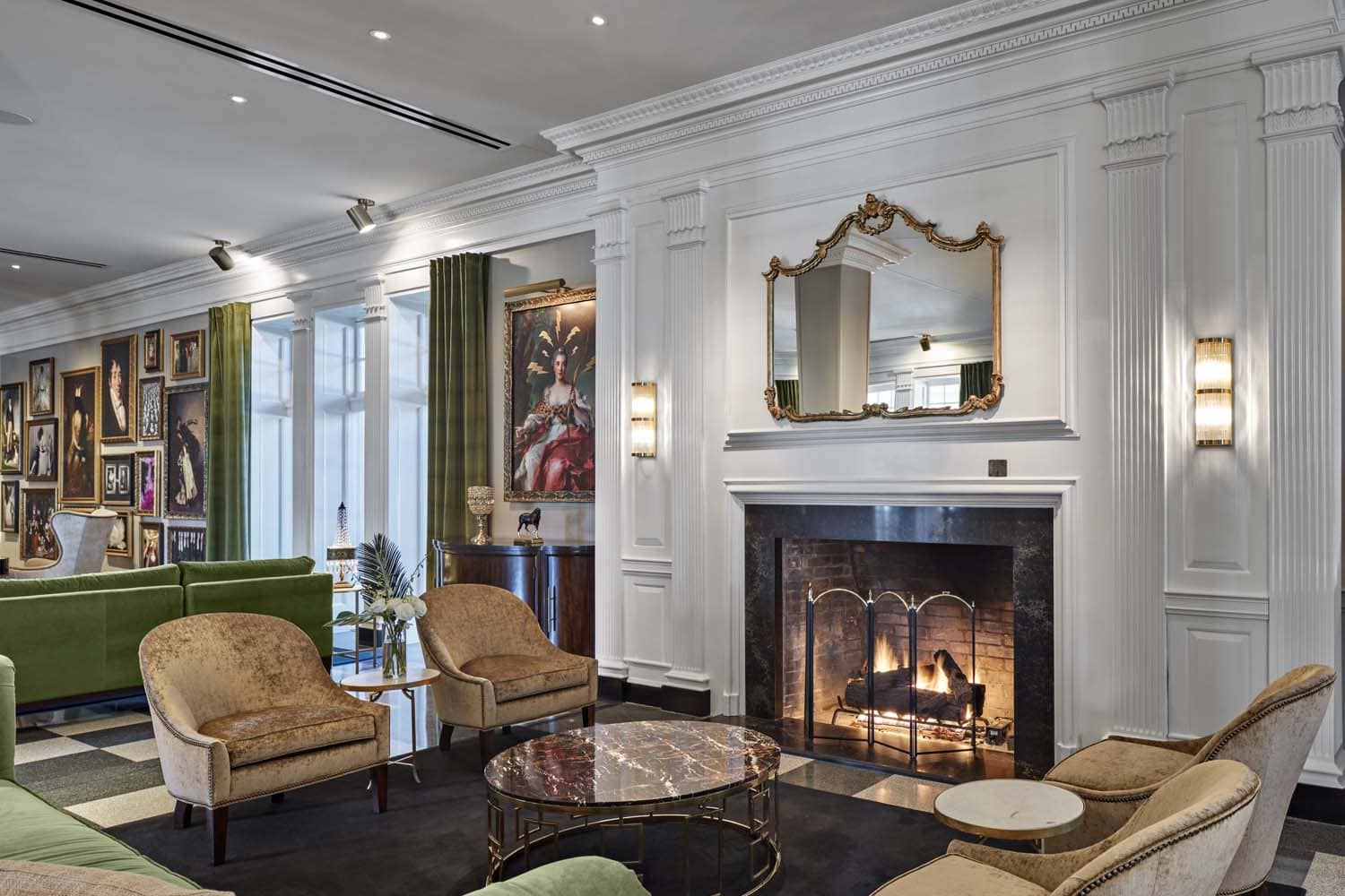 The interior lounge and fireplace inside The Raleigh Room