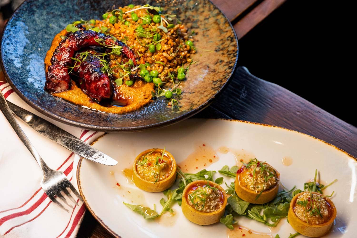 A close-up view of a plated dish on a table at the Hunt Room
