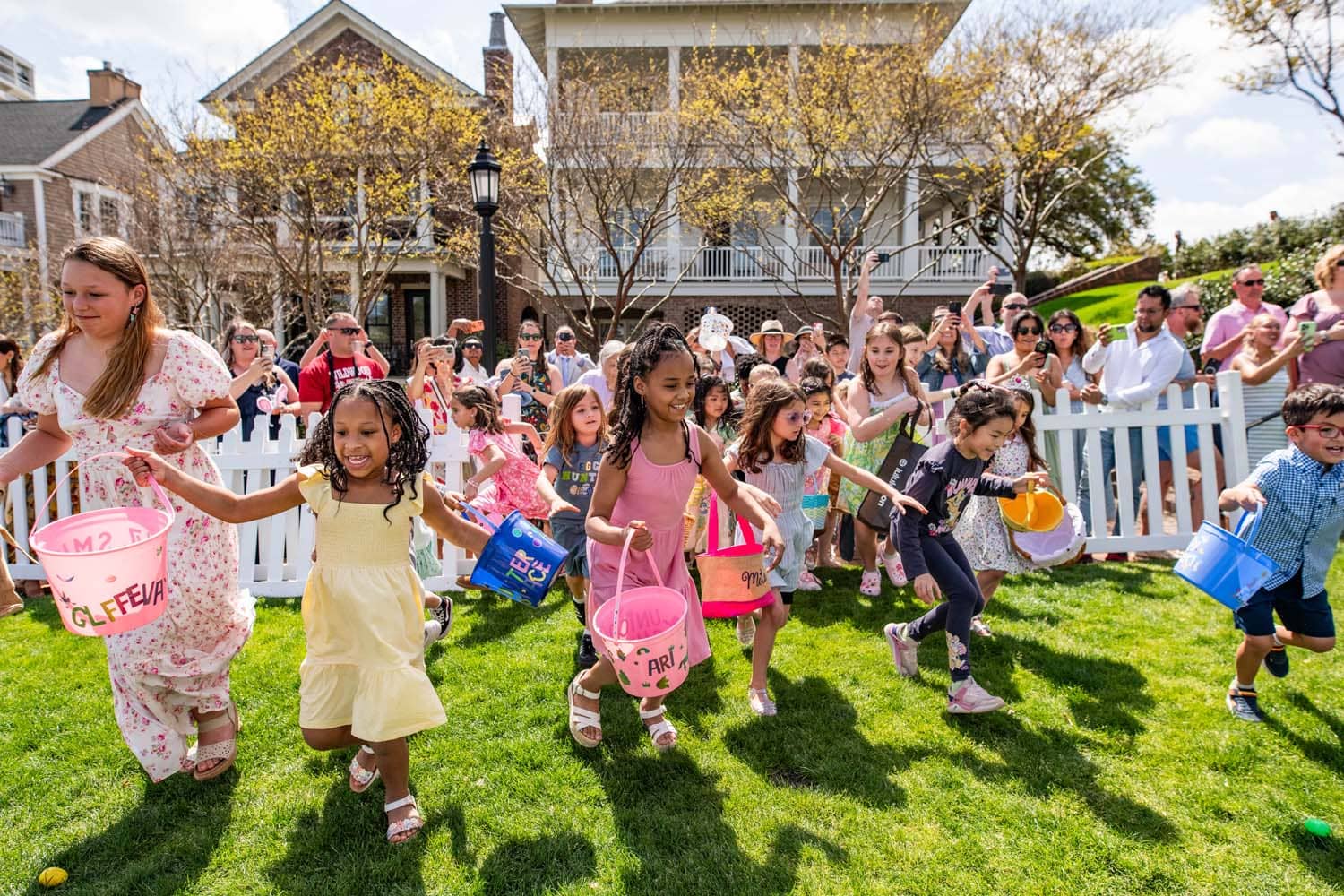 Children running on the lawn during Easter at The Historic Cavalier Hotel