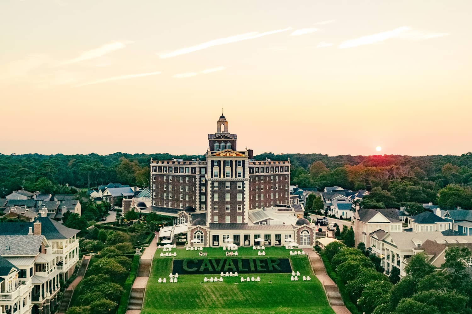 An aerial view of The Historic Cavalier Hotel at sunrise
