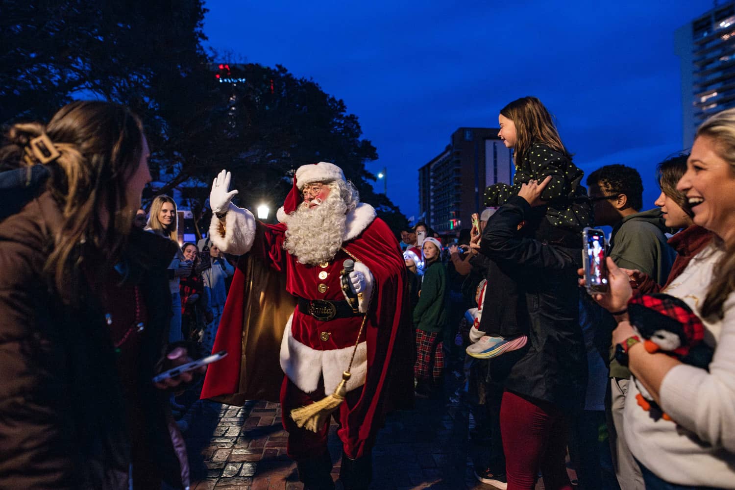 Santa greeting a crowd at The Cavalier Hotel Grand Illumination event